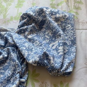 Nasty Gal runched body con dress, size 4 in the color blue with white flowers